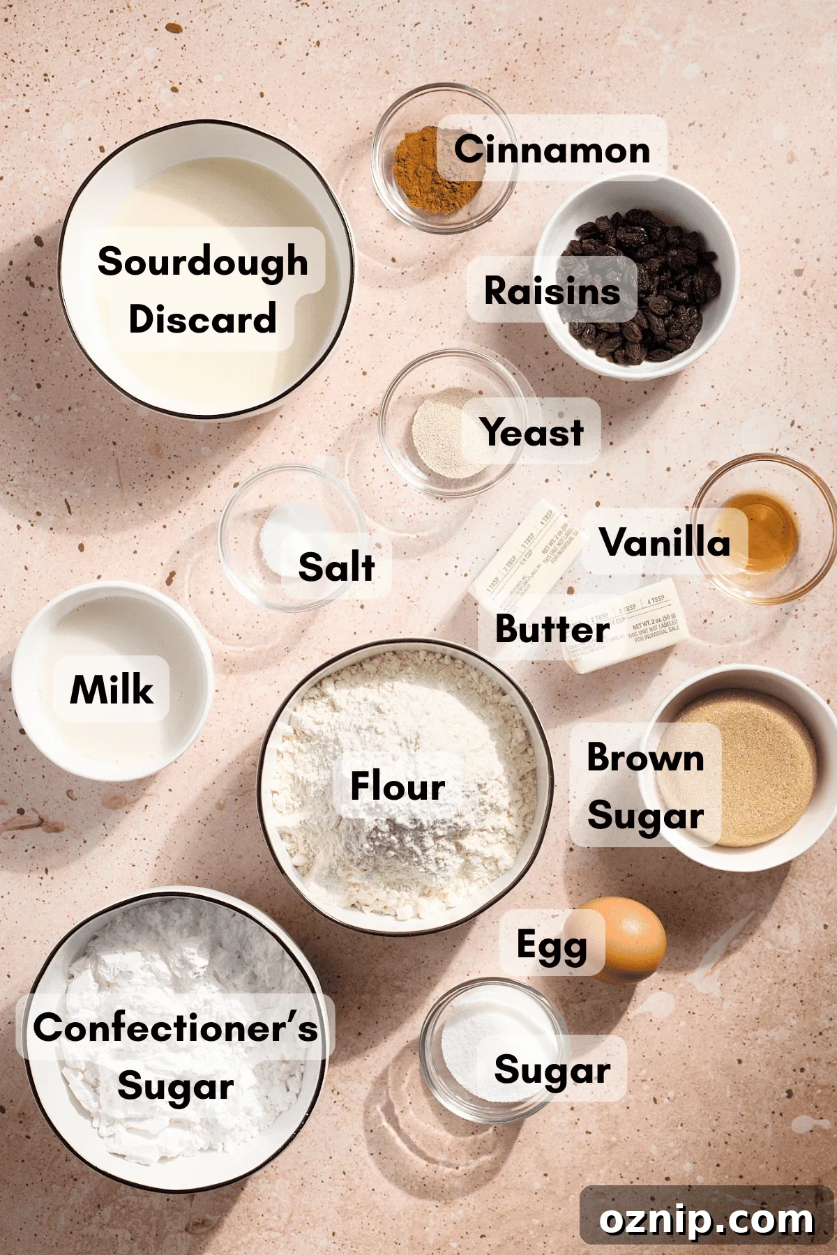 Ingredients for Sourdough Discard Cinnamon Roll Pull Apart Bread in small bowls.