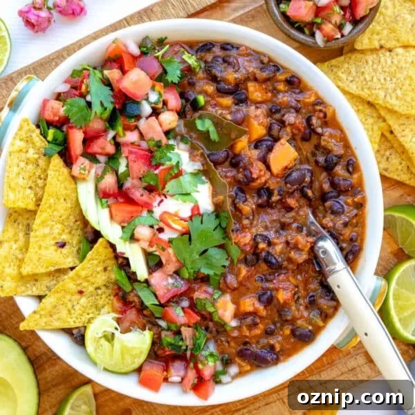 Black bean soup in a white bowl as a healthy soup meal.