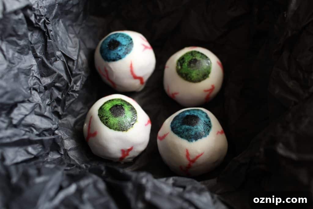 These Halloween white chocolate eyeballs have a surprise filling: purple sweet potato!
