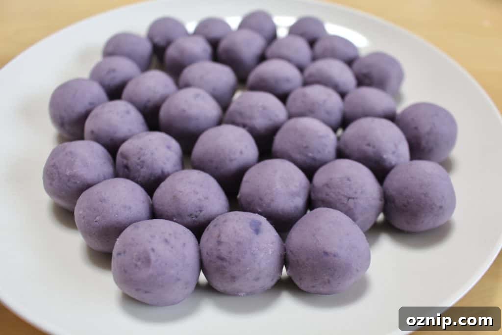 Purple sweet potato balls to be covered with white chocolate