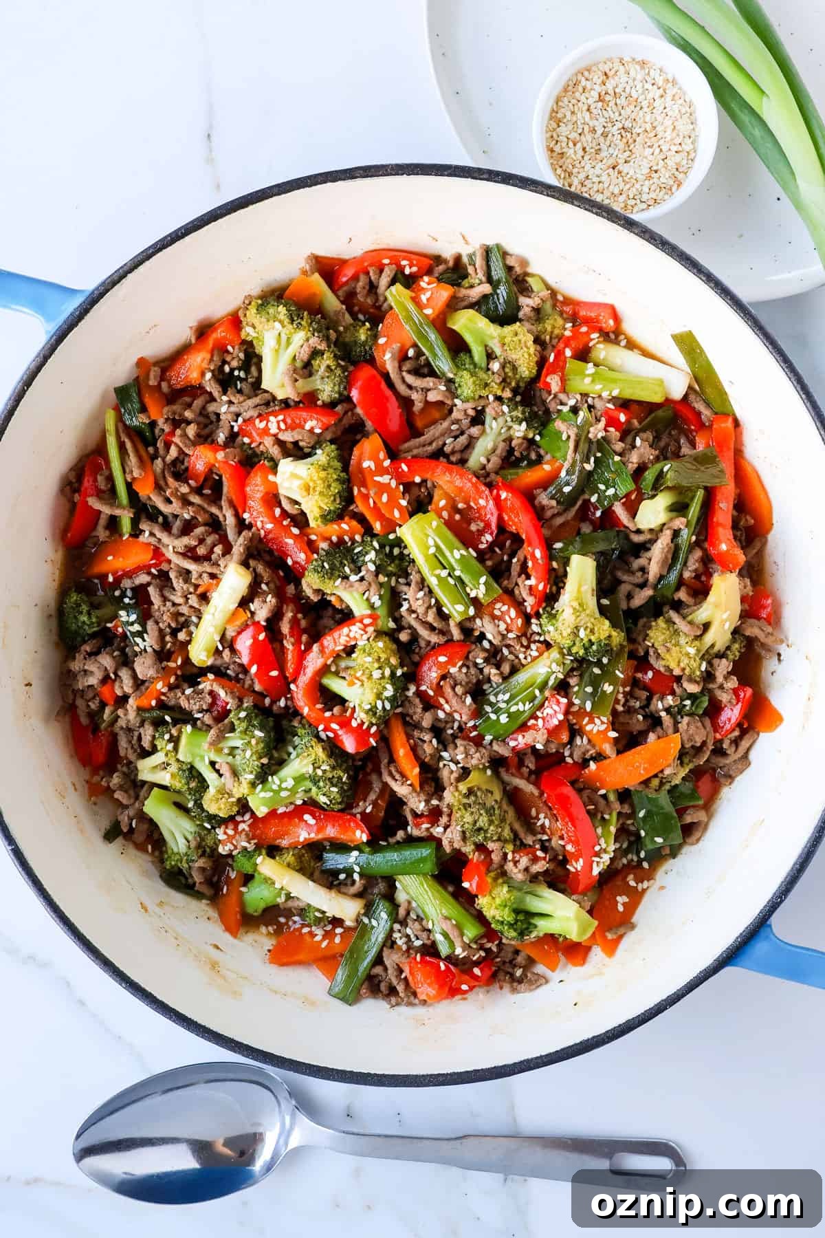 Teriyaki Beef Bowls with Rice and Vegetables 9 Teriyaki beef stir fry in pan.