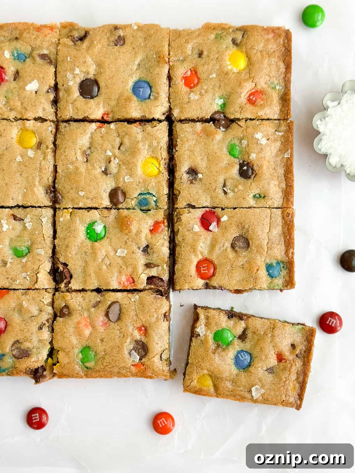 Browned Butter M&M Blondies 2 brown butter m&m blondies cut into squares.