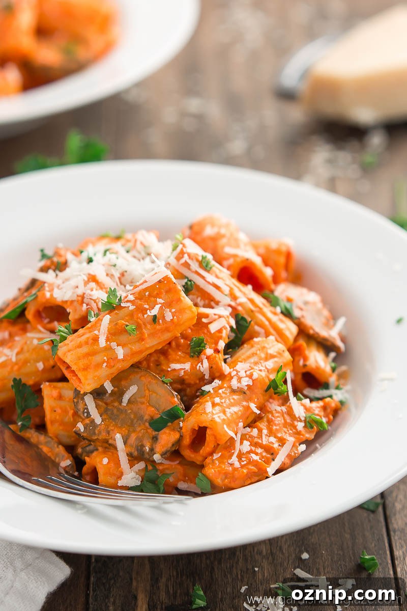 Serve a restaurant quality meal at home and robe your pasta, chicken, and mushrooms in a flavorful creamy roasted red pepper sauce. This Copycat Roasted Red Pepper Pasta Brio will soon be a family favorite!