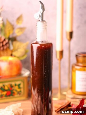 apple brown sugar syrup in a glass bottle.