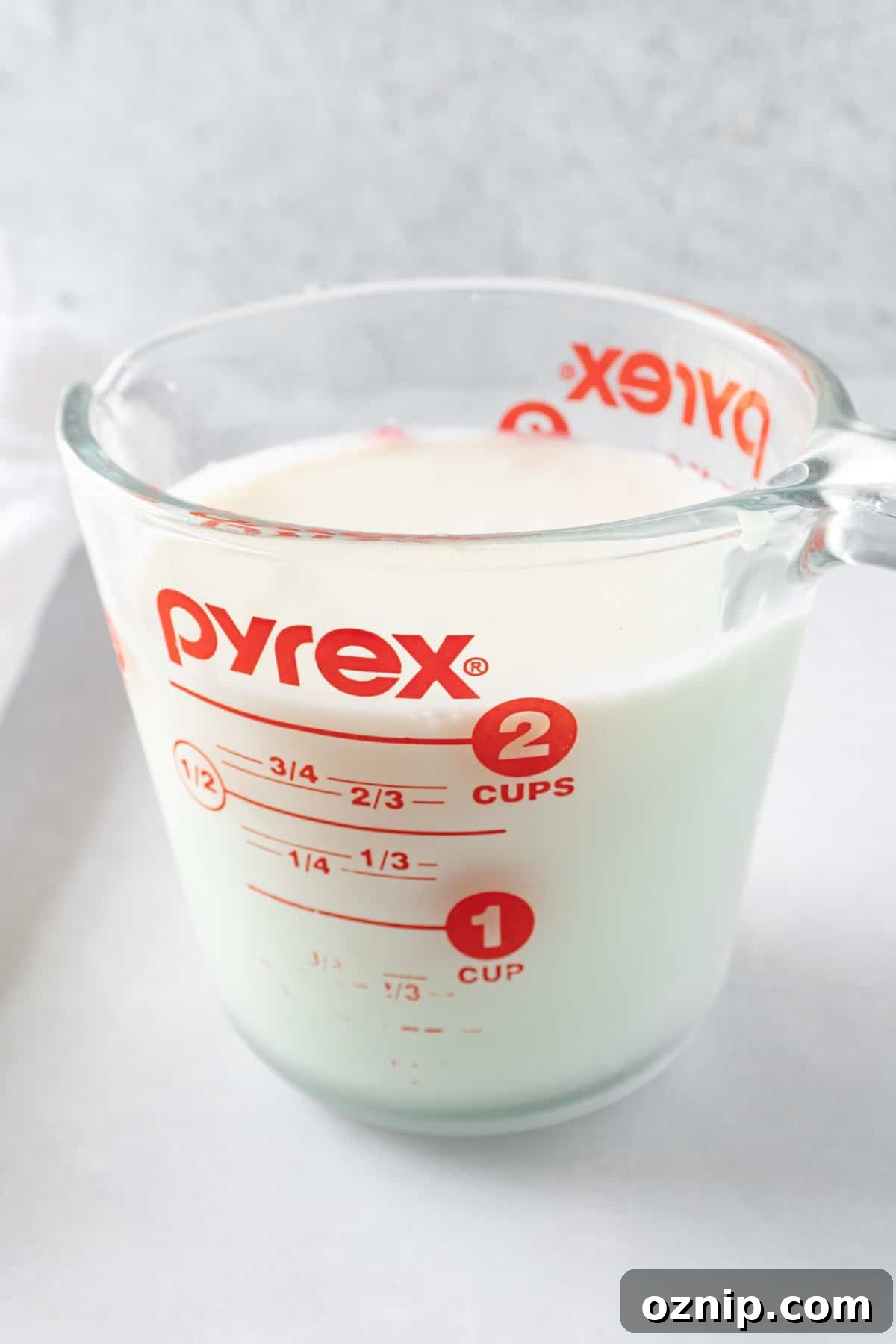 Is Your Buttermilk Spoiled? How to Spot the Signs 2 good buttermilk in a glass pyrex measuring cup