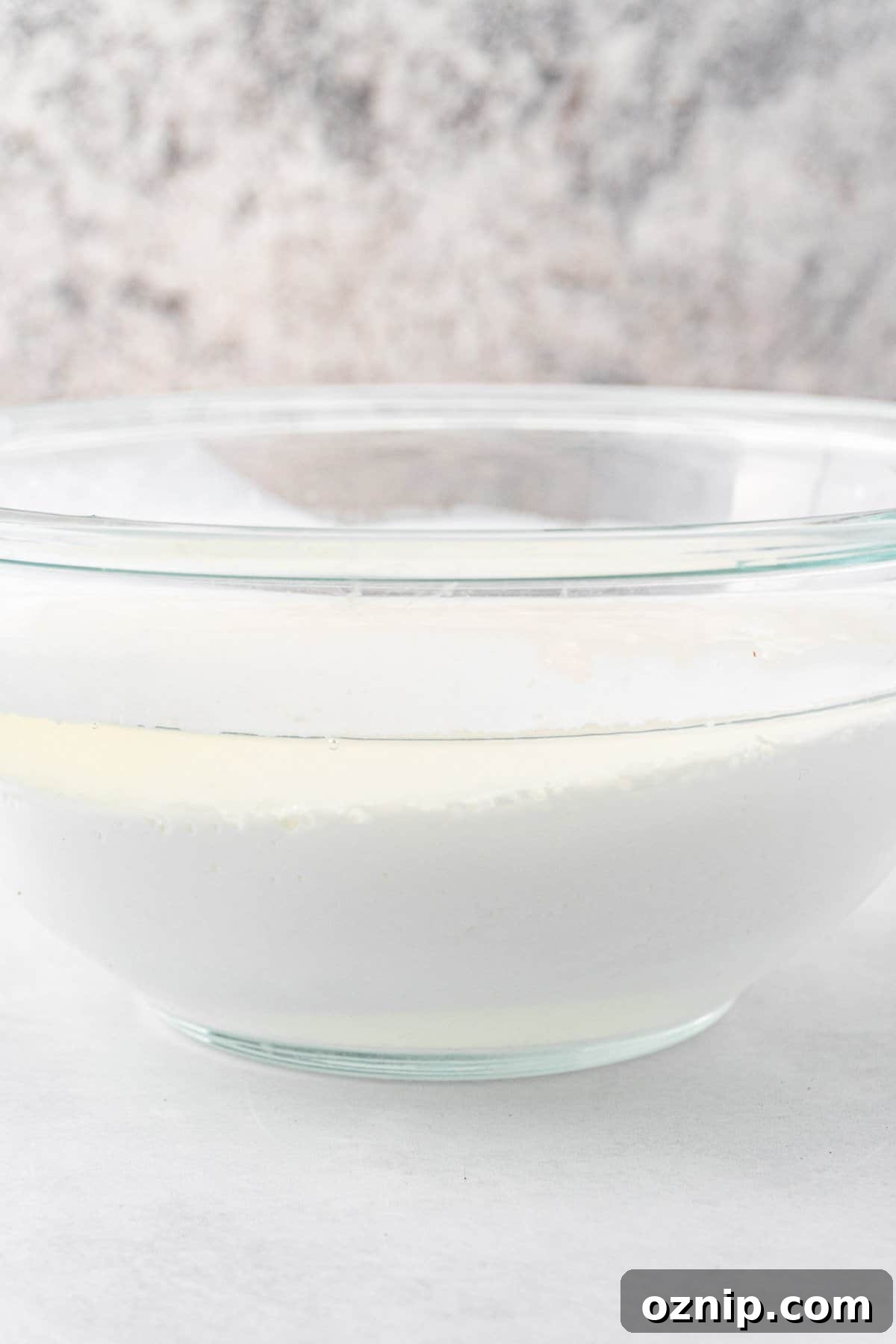 Is Your Buttermilk Spoiled? How to Spot the Signs 5 water and fat in buttermilk separated in glass bowl.
