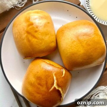 overhead shot of fried mantou in plate with side of condensed milk