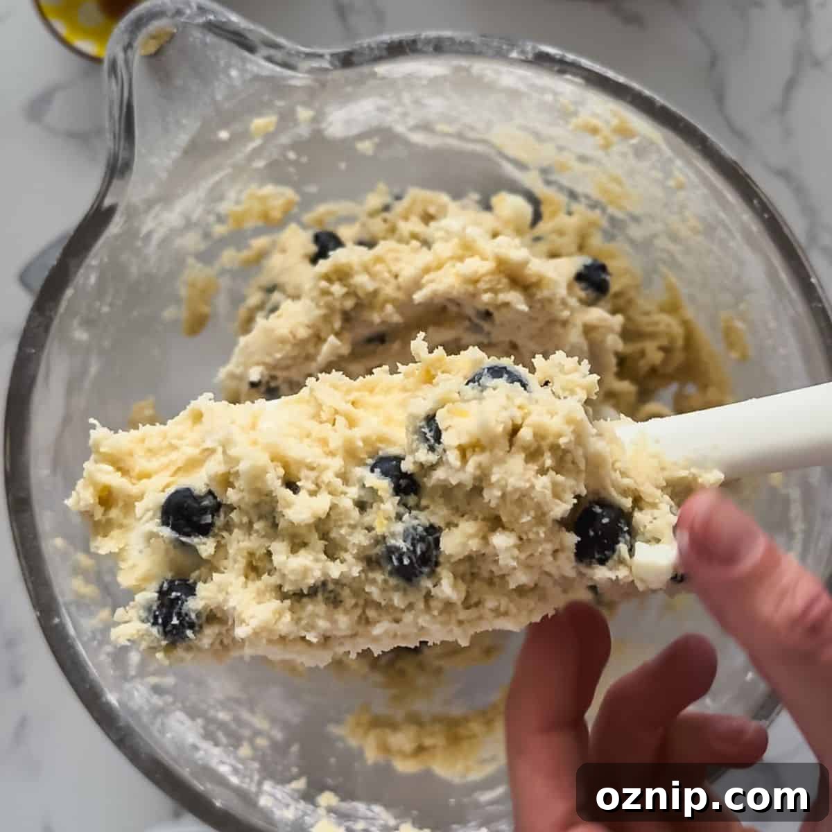 lemon blueberry cookie dough in a bowl.