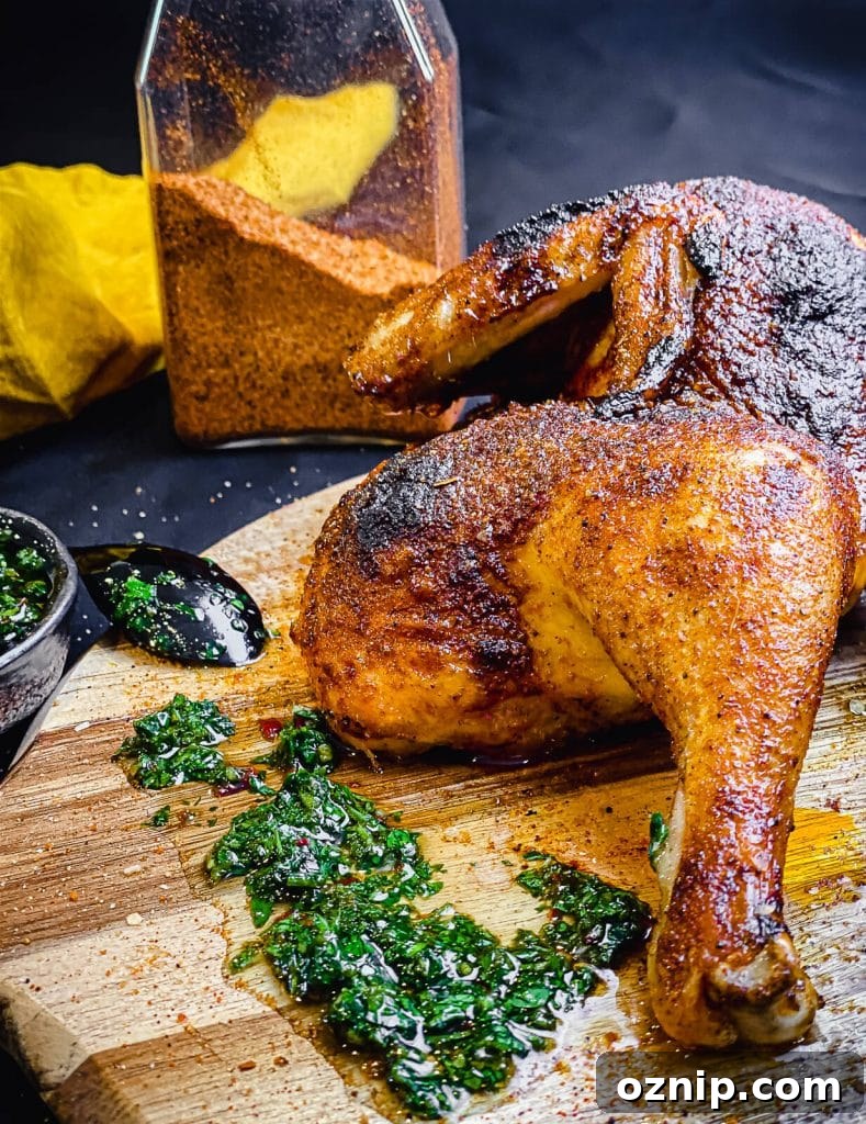 How to Grill Half Chicken for Juicy, Crispy Skin 3 chicken drumstick on a cutting board with chimichurri