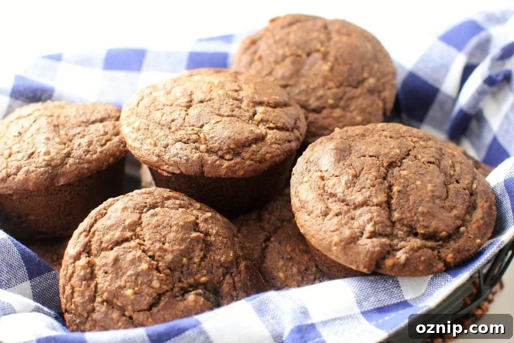 Basket of gluten free bran muffins with blue checked napkin