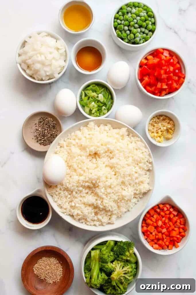 all ingredients in healthy fried rice in small bowls
