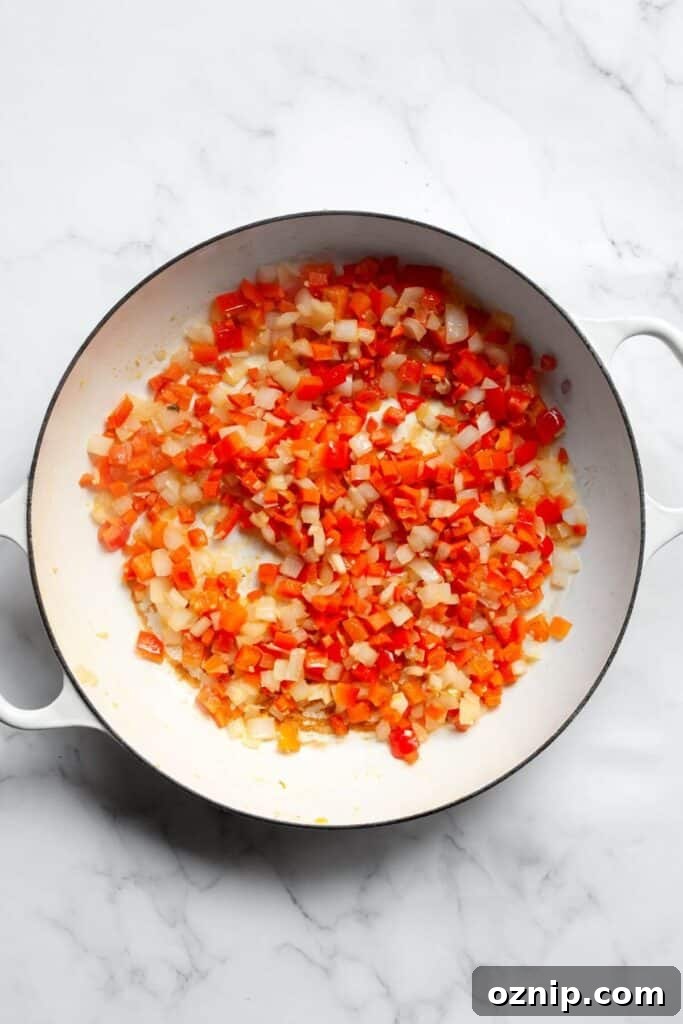 sauting onions, bell pepper, and carrots