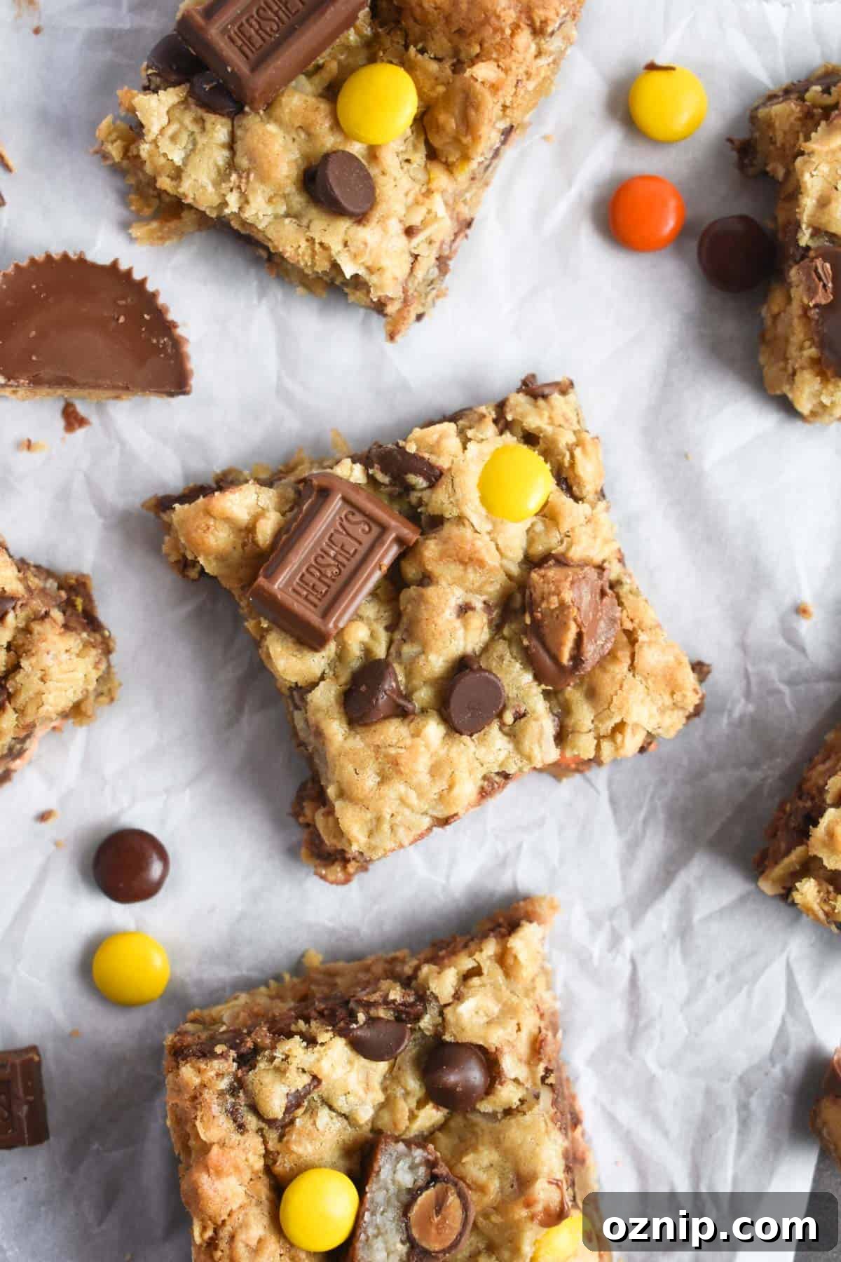 Halloween Candy Cookie Bars with Leftover Candy 8 overhead shot of cookie bar with candy on the side.
