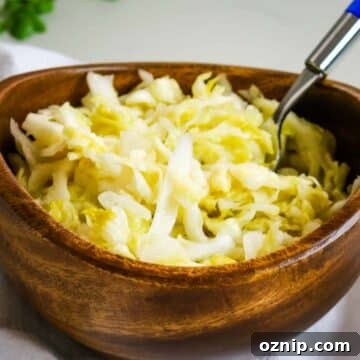 raw sauerkraut in wooden bowl.
