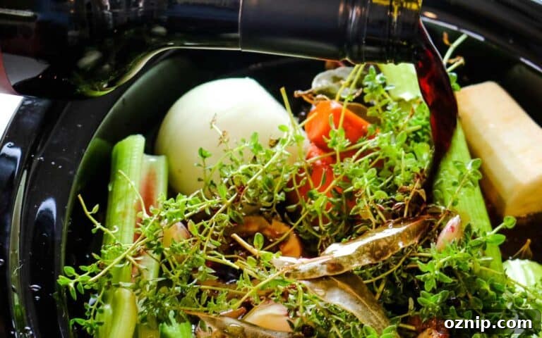 adding red wine to broth.