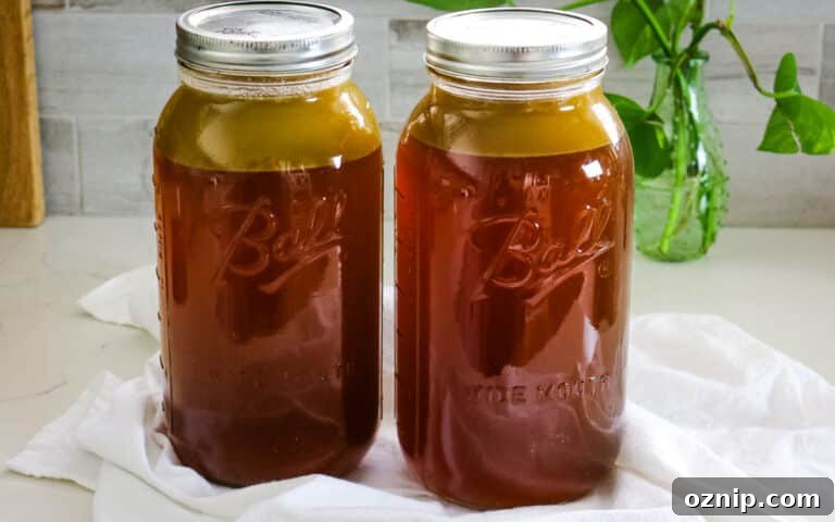 mason jars with bone broth inside.