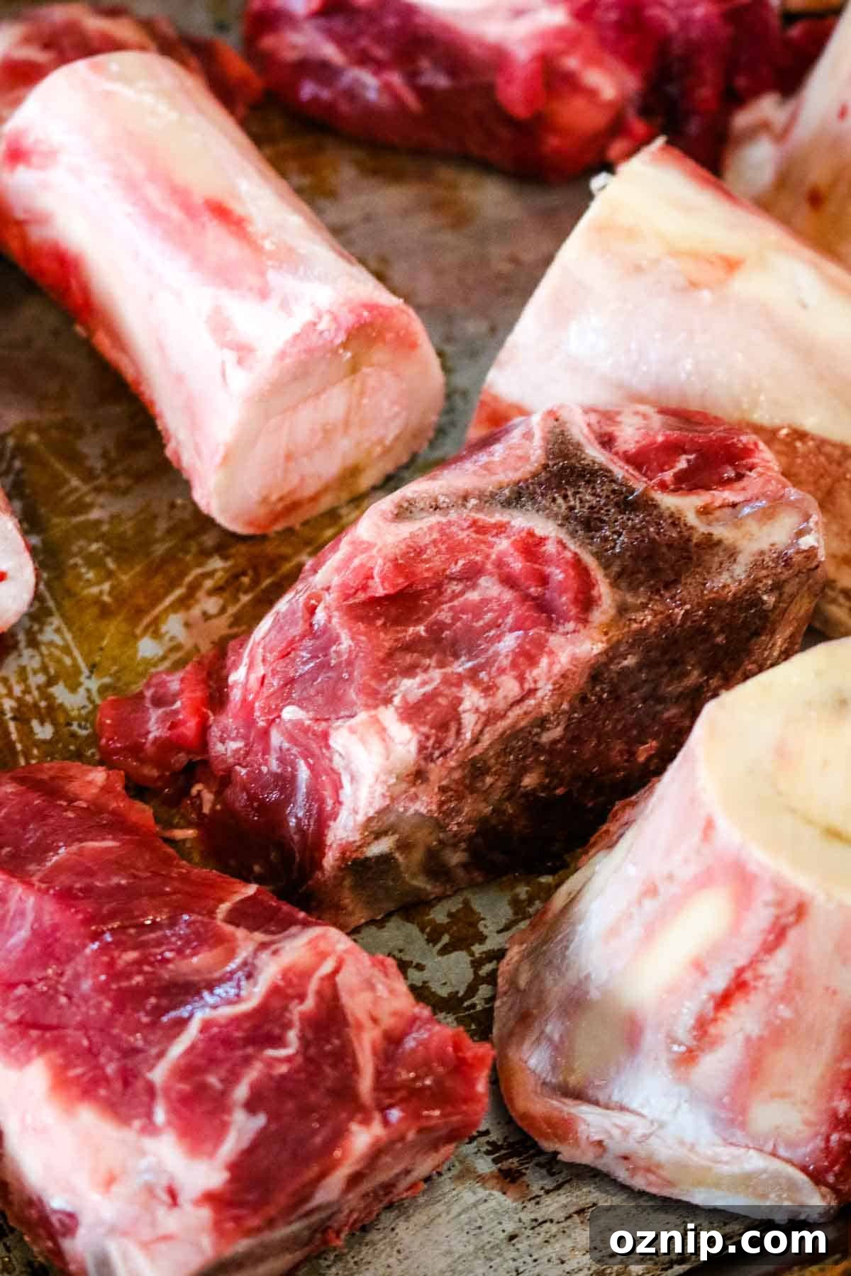 soup bones on a sheet for roasting.