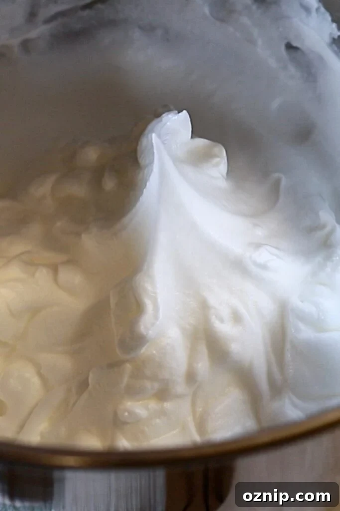 stiff meringue in a mixing bowl