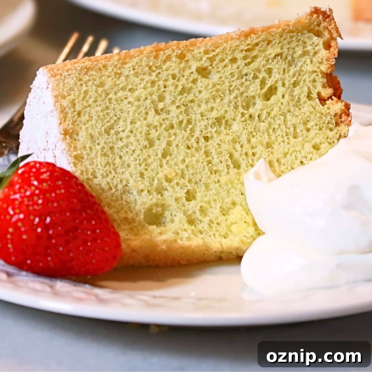 a slice of fluffy chiffon cake on a plate