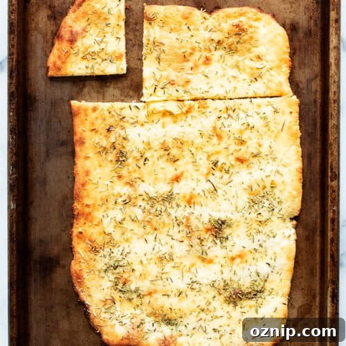 keto gluten-free rosemary flatbread overhead view on sheet pan