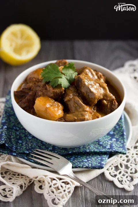 beef massaman curry in a white bowl