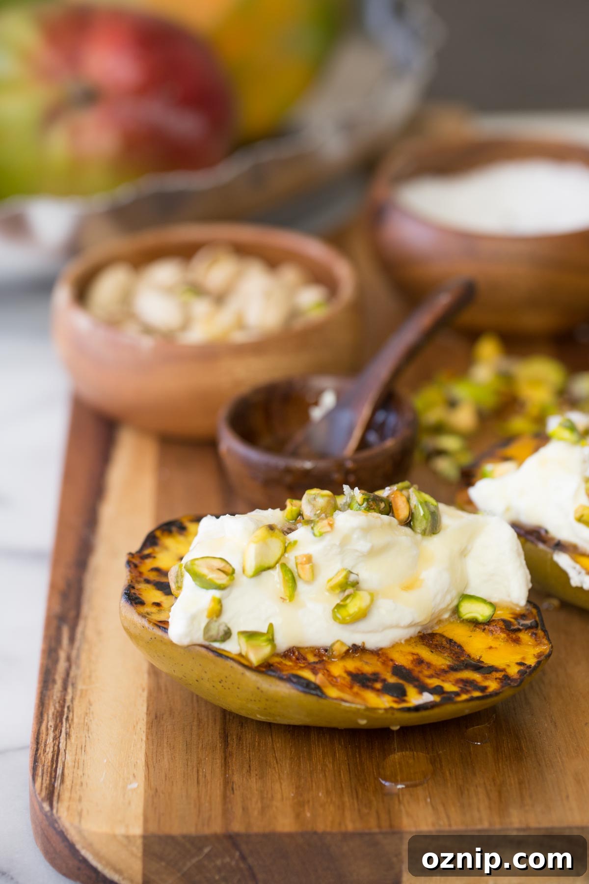 Grilled Mango with Honey Whipped Ricotta 8 Wooden board with Grilled Mango With Honey Ricotta Whipped Cream