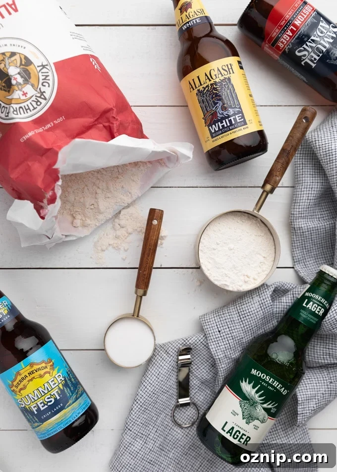 Classic Beer Bread Recipe with Crispy Crust 3 flatlay showing an open bag of all purpose flour, measuring cups filled with flour and sugar, and 5 different bottles of beer