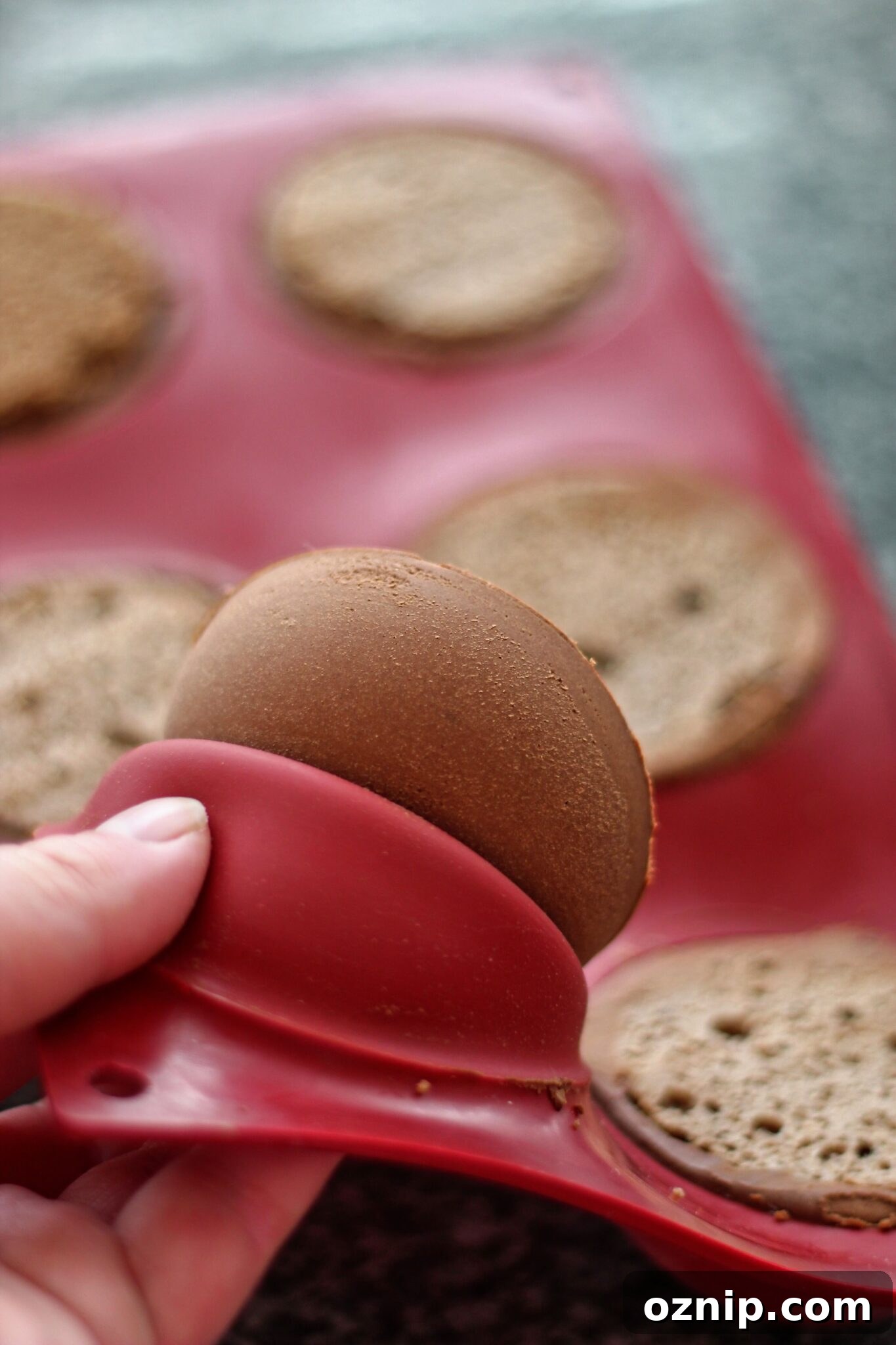 popping mousse cakes out of molds
