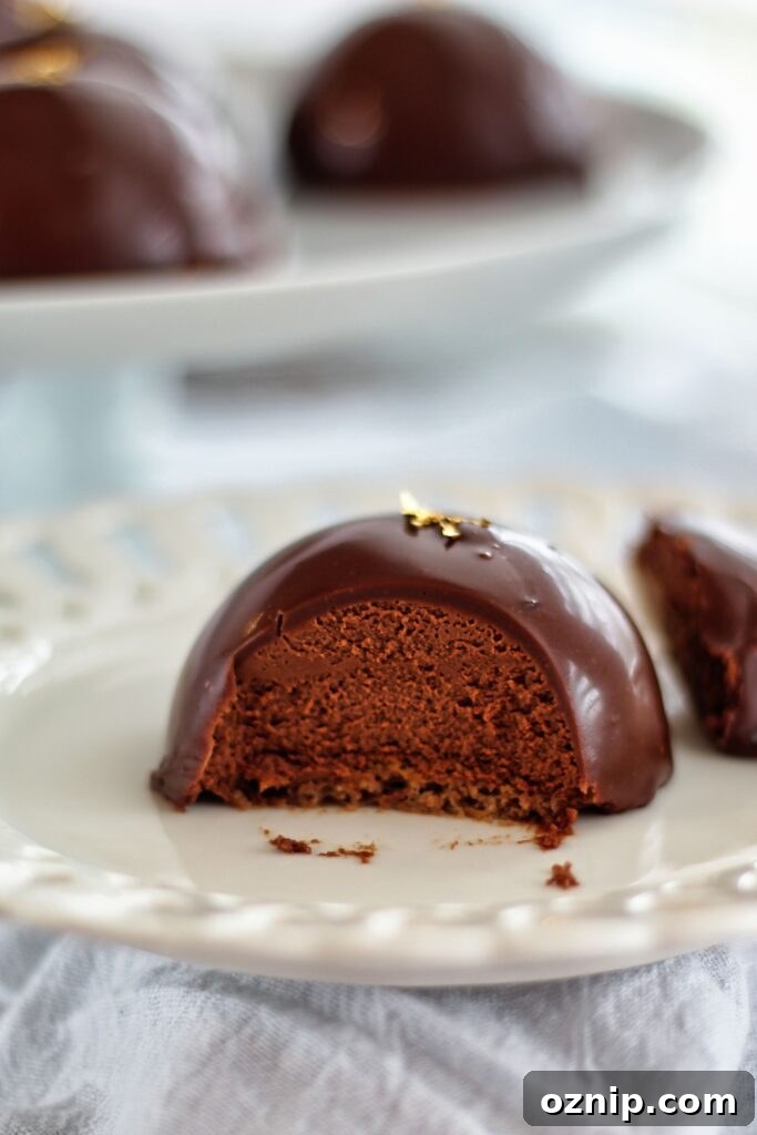 showing inside of mousse cake on white plate