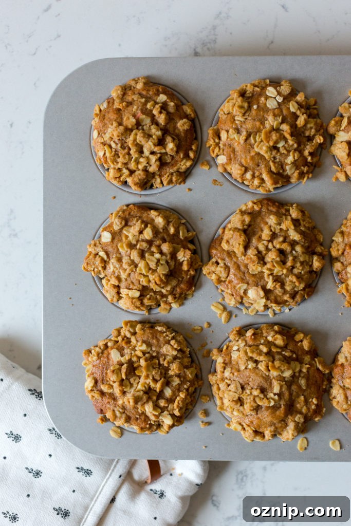 Apple Cider Oat Streusel Muffins cooling