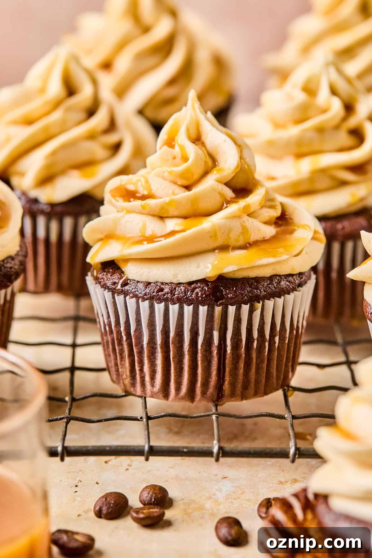 Salted Caramel Mocha Cupcakes 2 Mocha cupcakes with salted caramel buttercream topped with caramel sauce.
