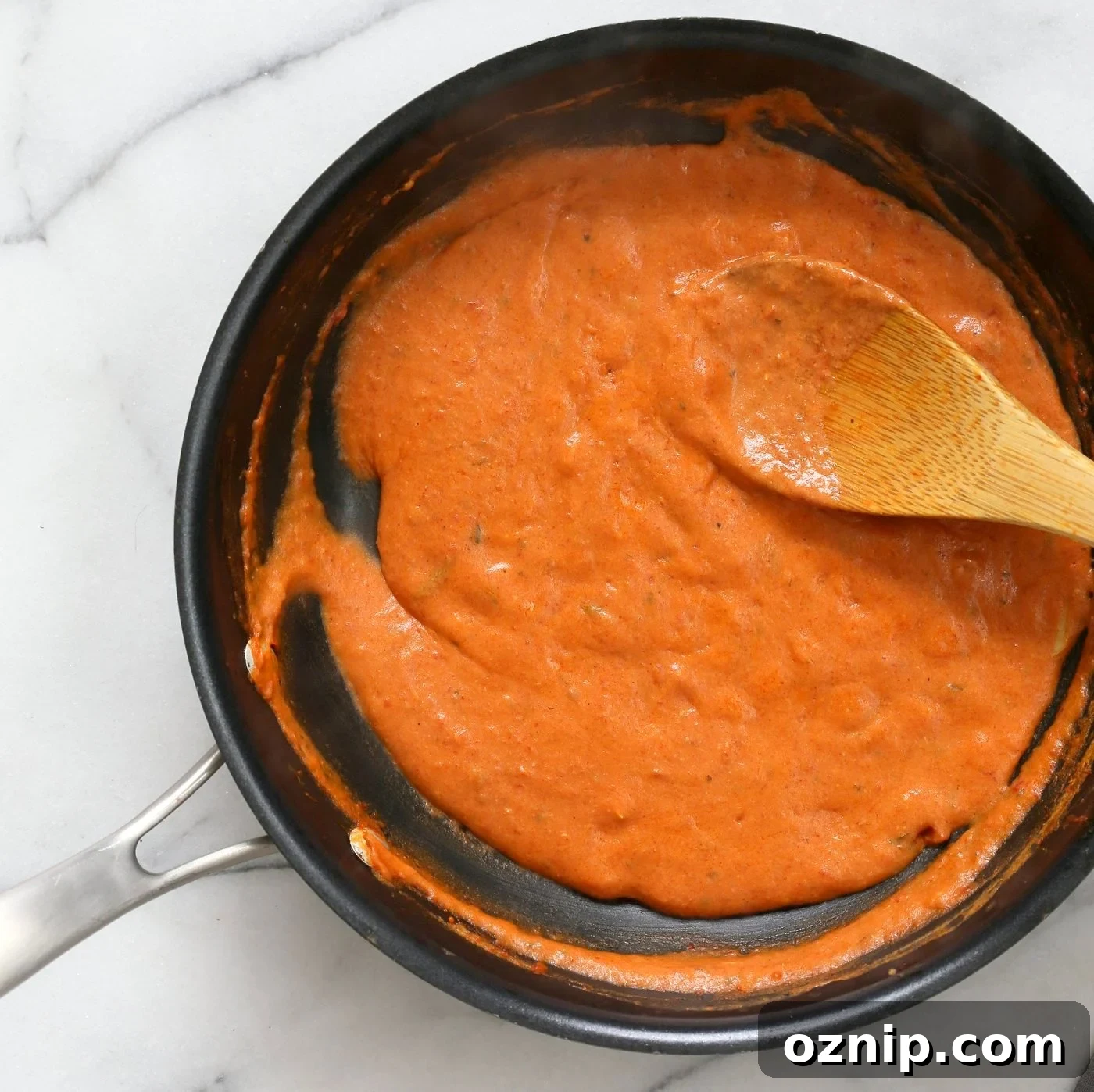 Indian Butter Sauce in black skillet for Butter Tofu Paneer