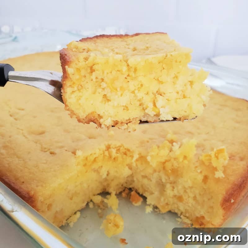 30+ Side Dishes for Soup to Complete Your Meal 15 Square of Cornbread on a serving spoon over a dish of cornbread