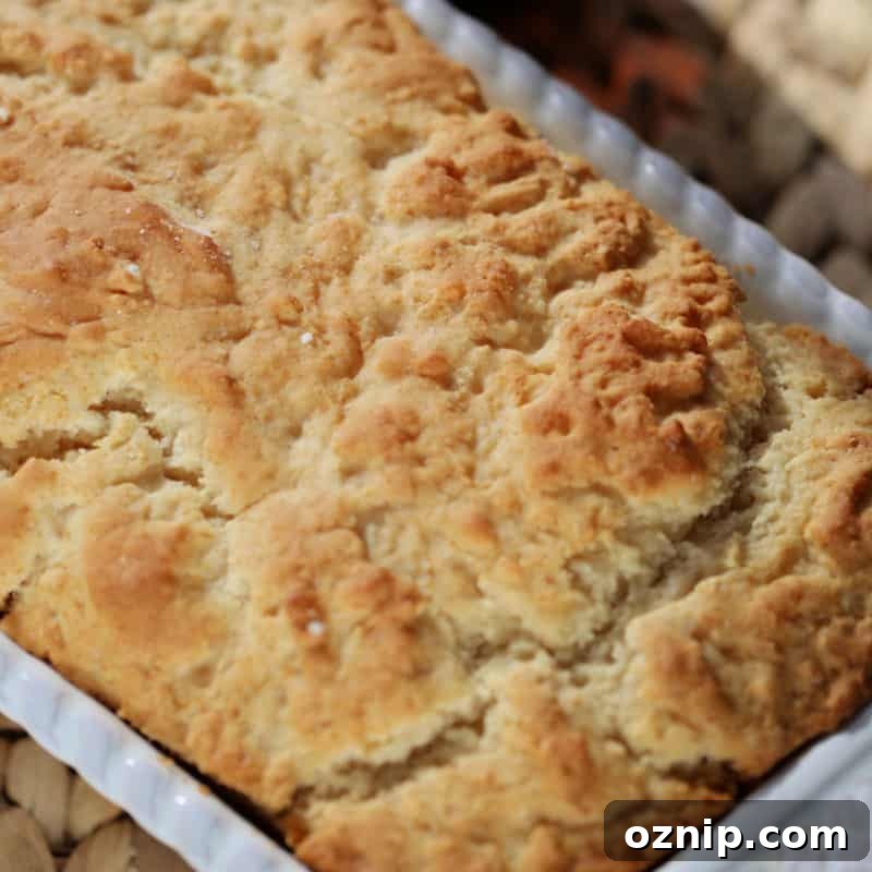 30+ Side Dishes for Soup to Complete Your Meal 16 Pumpkin Beer Bread in a white baking dish