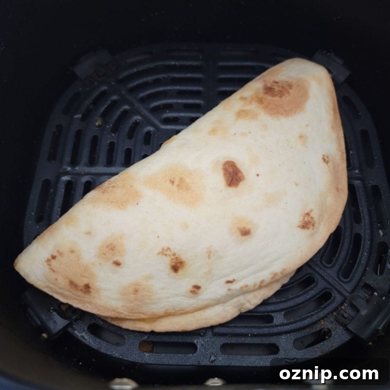 30+ Side Dishes for Soup to Complete Your Meal 24 air fried quesadilla in an air fryer basket.