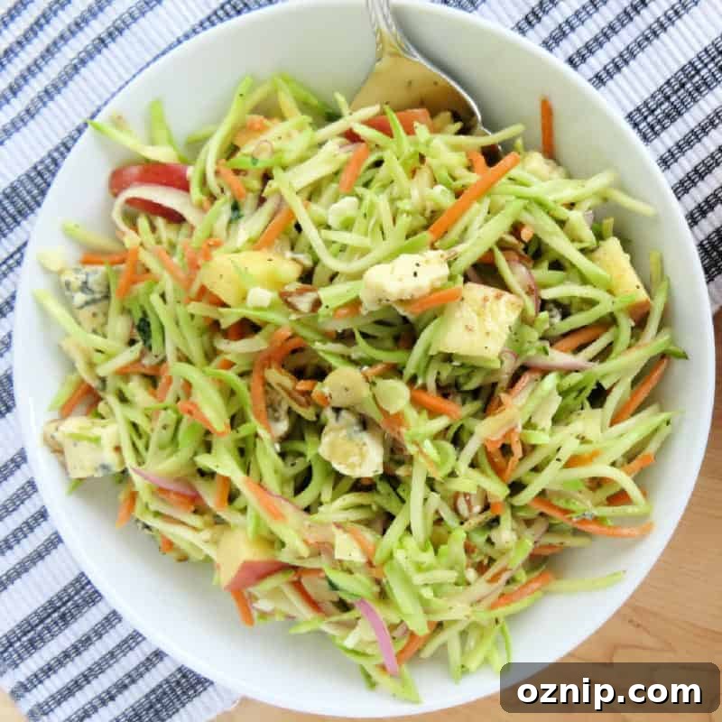 30+ Side Dishes for Soup to Complete Your Meal 25 Broccoli slaw in a white bowl with a fork