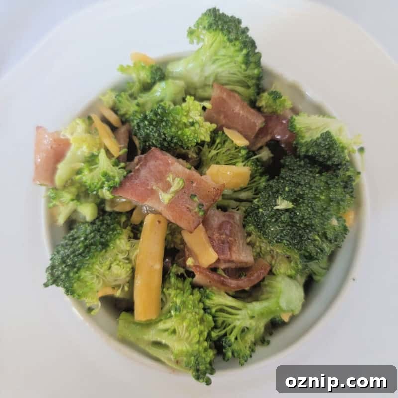 30+ Side Dishes for Soup to Complete Your Meal 26 Broccoli Bacon Salad in a white Bowl