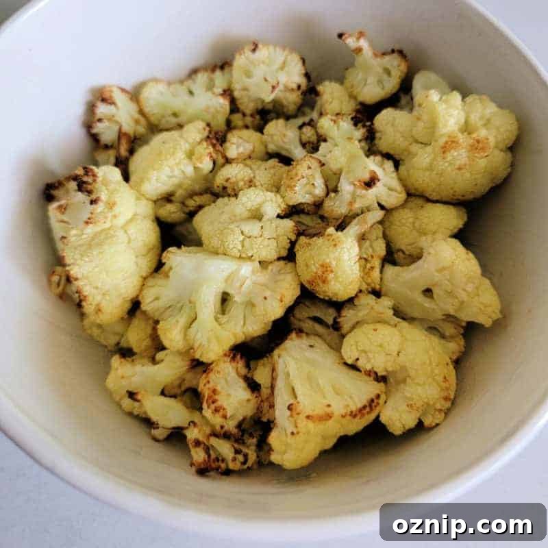 30+ Side Dishes for Soup to Complete Your Meal 30 Air fried cauliflower in a white bowl