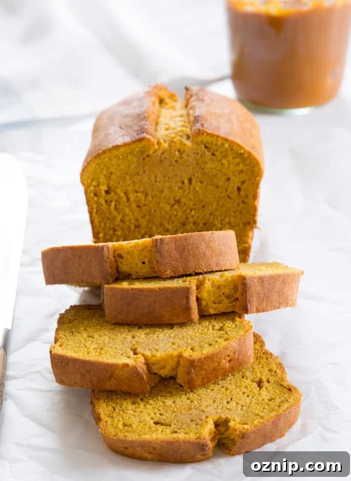 Classic gluten free pumpkin bread, made simply with just the right spices. A moist, tender celebration of fall!