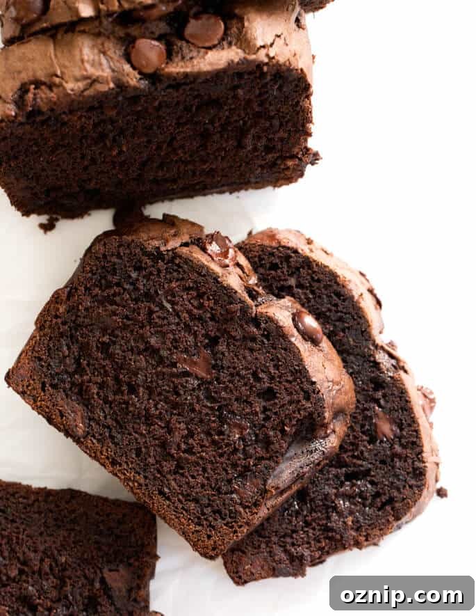 This moist and fudgy double chocolate gluten free zucchini bread will have you wondering how it’s possible that there are 2 cups of grated vegetables hidden inside!