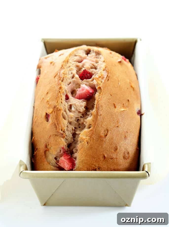 This soft and tender gluten free strawberry bread is lightly sweet and packed with strawberry flavor. A perfect spring alternative to banana bread!