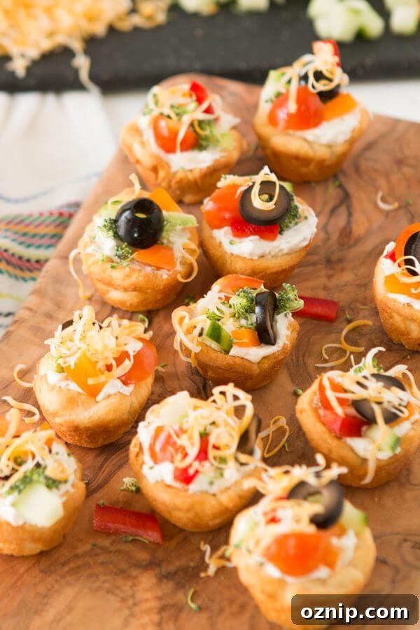 Quick and easy veggie pizza tarts with the best filling I've had for this easy appetizer