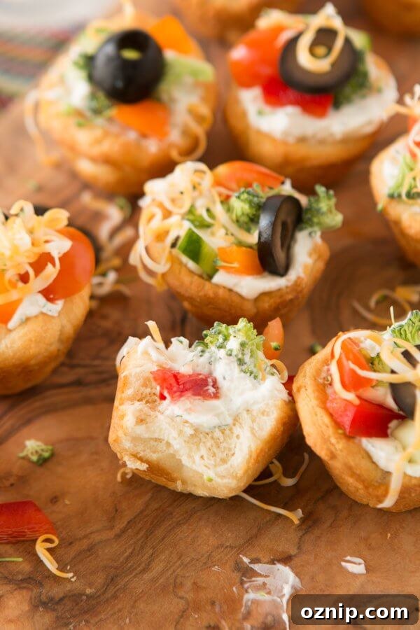 Quick and easy veggie pizza tarts with the best filling I've had for this easy appetizer