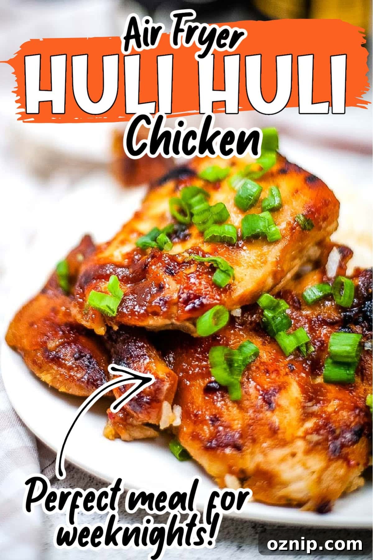 Air Fryer Huli Huli Chicken Recipe 8 Closeup view of Hawaiian BBQ Huli Huli chicken made in the air fryer and garnished with chopped green onions with text overlay.