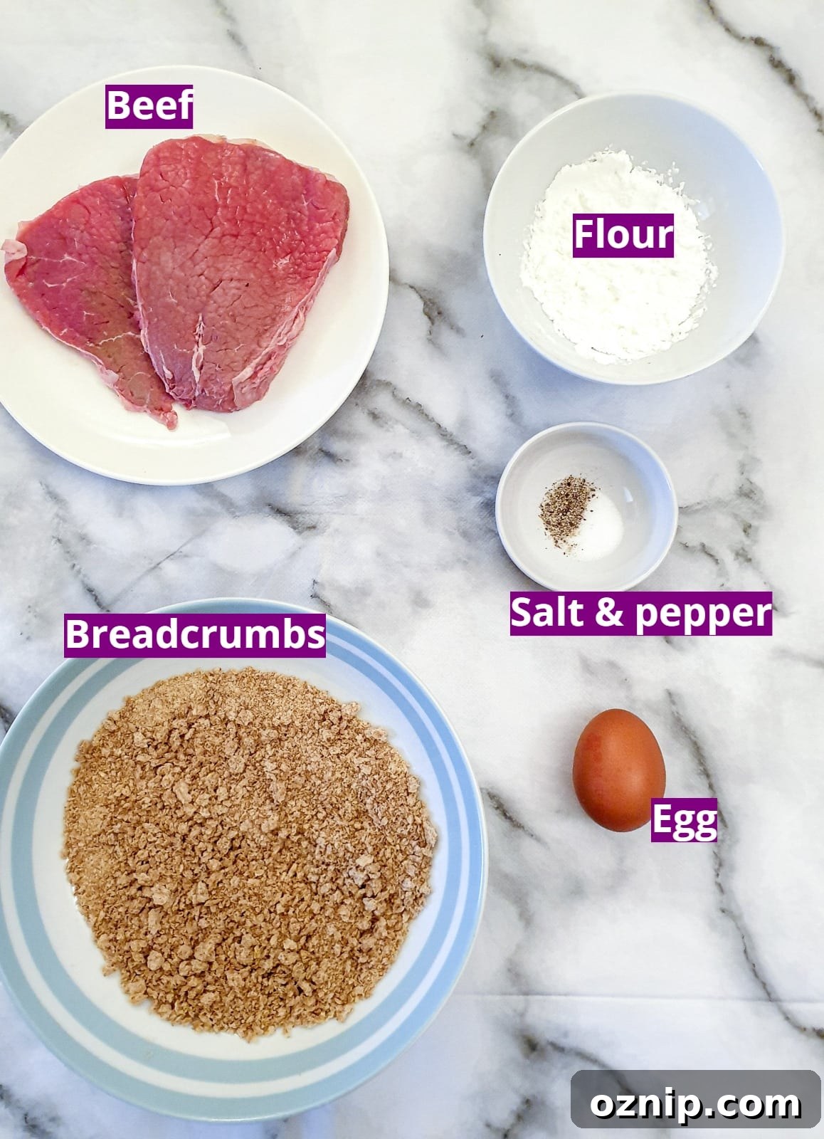 Ingredients for crispy crumbed beef schnitzels.