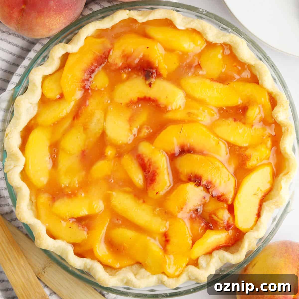 Baked Peach Pie with a Flaky Golden Crust 5 Homemade fresh peach pie recipe with fresh peach pie filling.