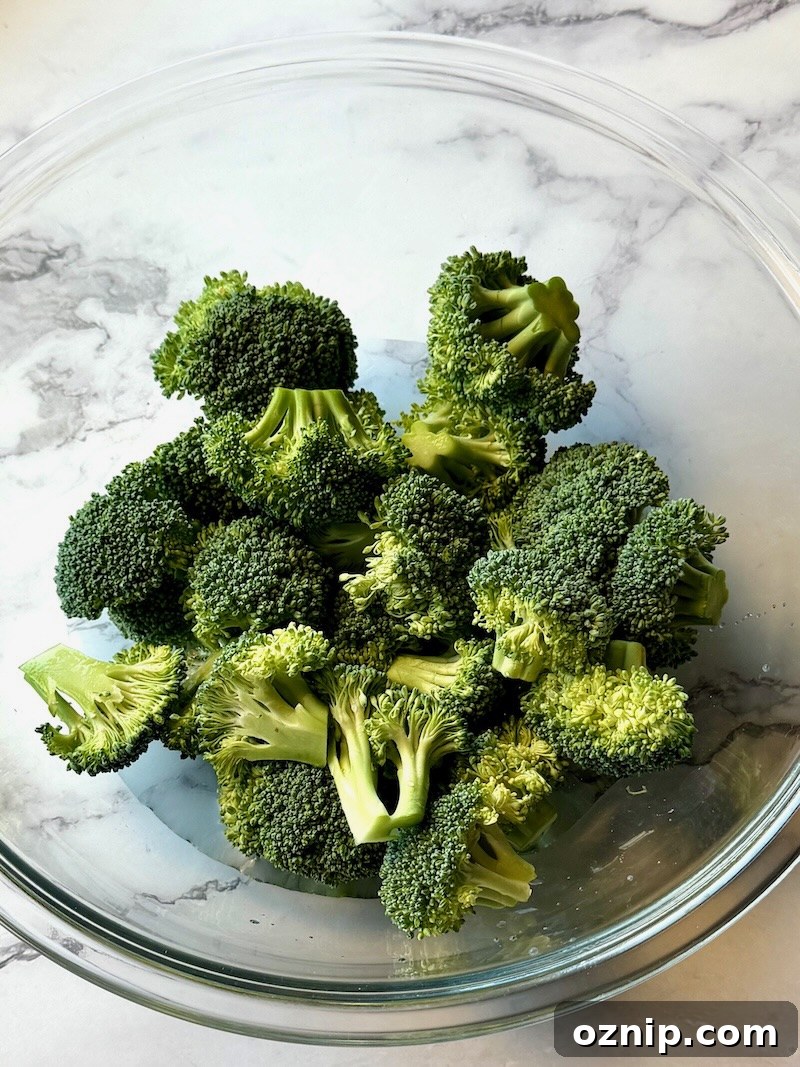 Creamy Honey Mustard Chicken with Broccoli 4 Steamed broccoli in a bowl.