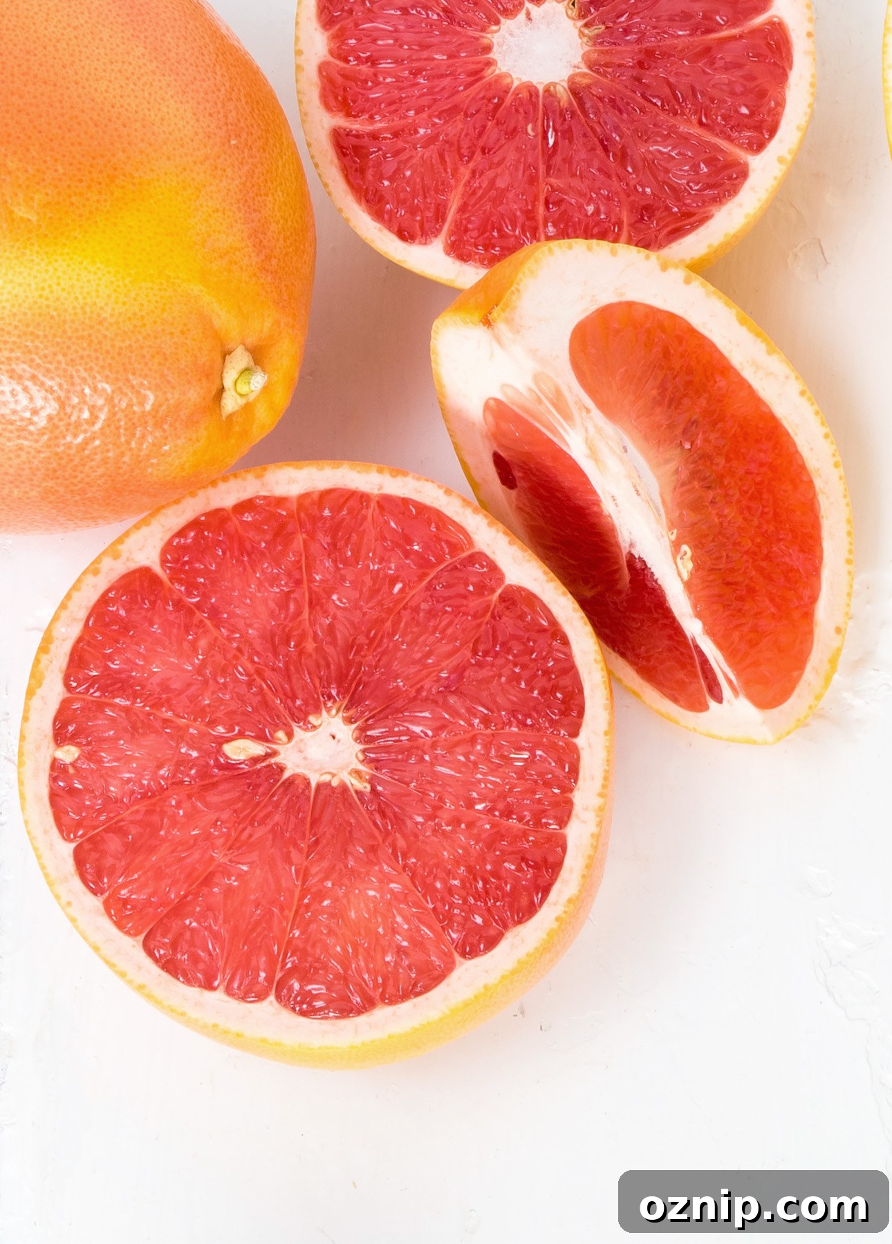Maple Paloma Cocktail with Tequila and Grapefruit 3 Sliced pink grapefruits