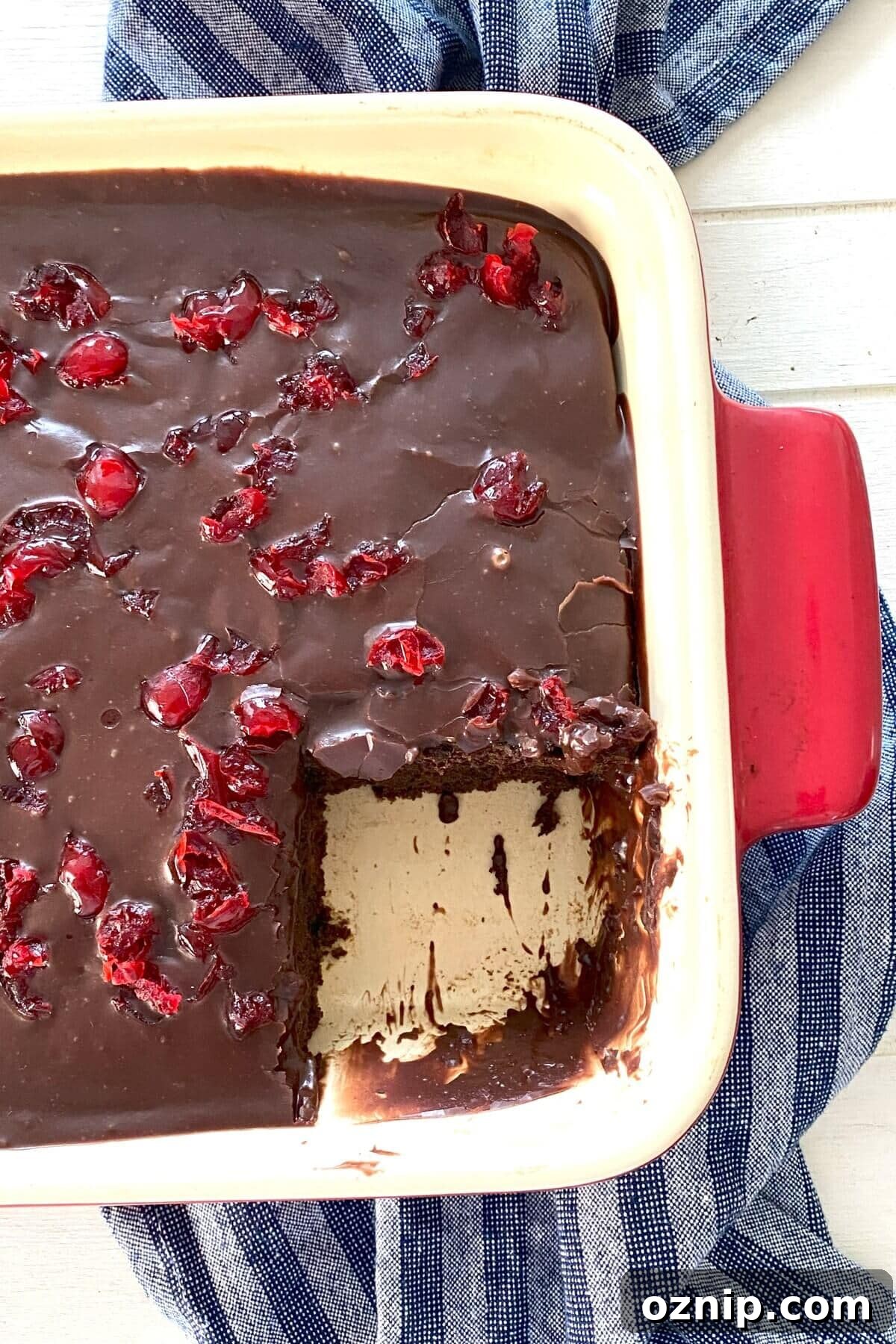 A cake with a piece cut out.