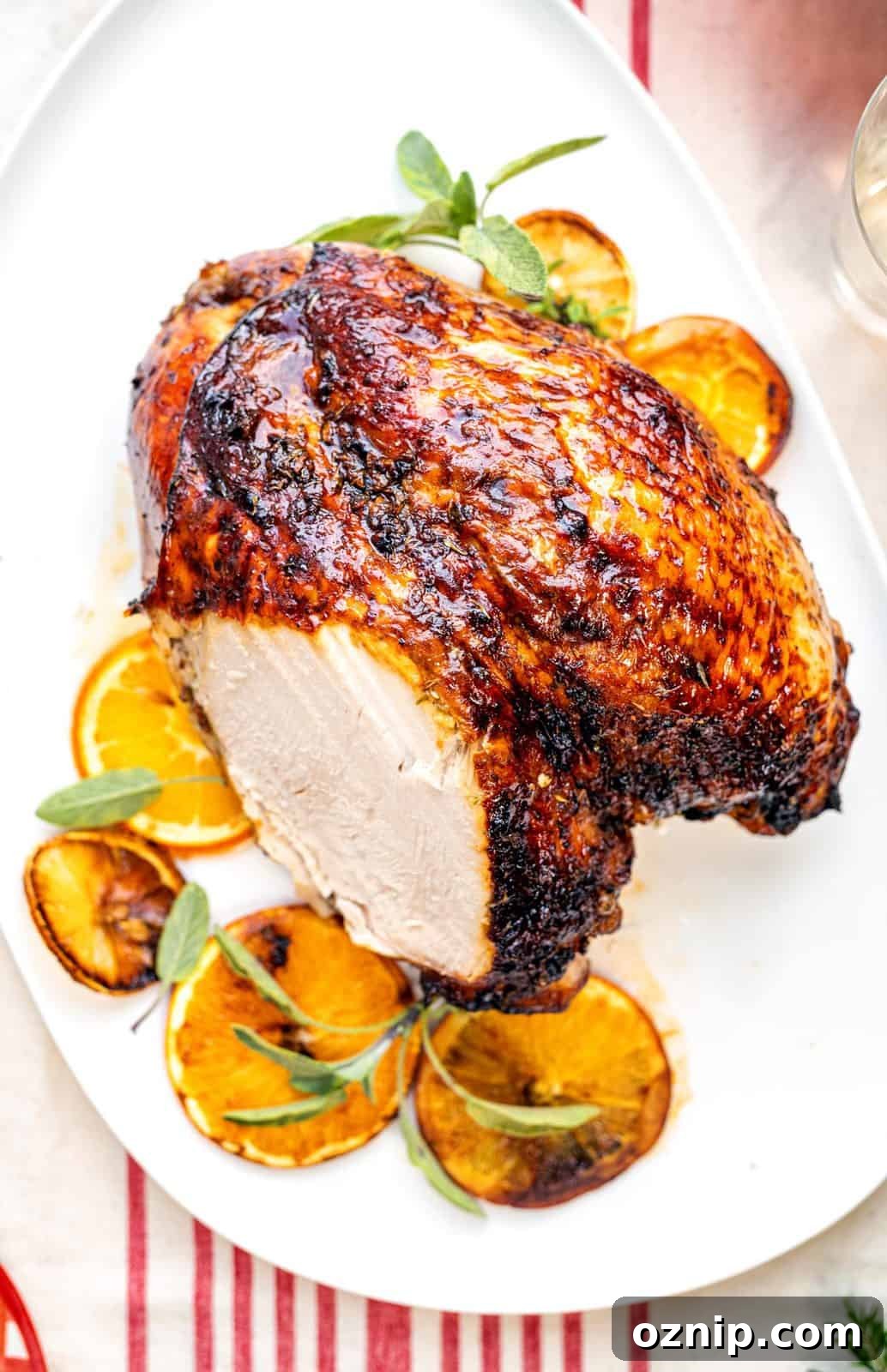 How to Roast a Turkey Crown: Step-by-Step Cooking Guide 4 Sliced roast turkey crown on a white platter